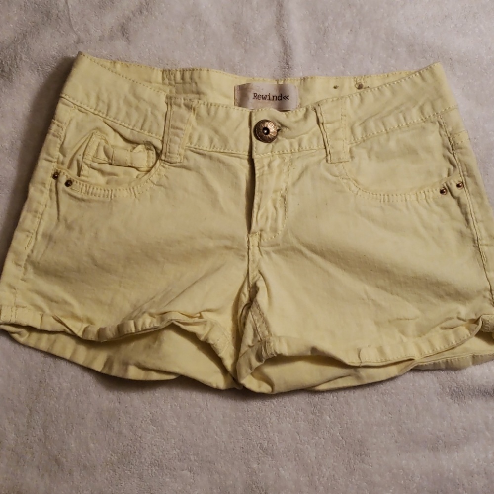 Yellow jean shorts.